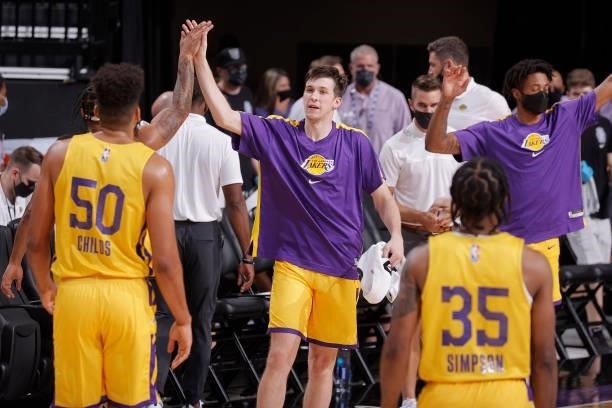 Austin Reaves of the Los Angeles Lakers high fives a teammate against the Miami Heat during the 2021 California Classic Summer League on August 3,...