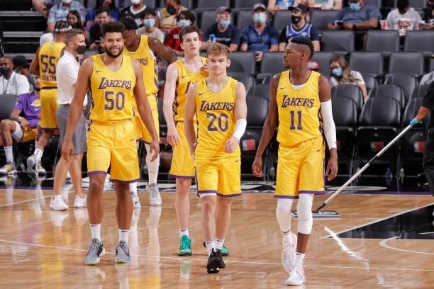 Mac McClung, Yoeli Childs, Austin Reaves, and Joel Ayayi of the Los Angeles Lakers look on against the Miami Heat during the 2021 California Classic...