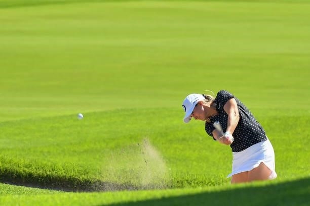 Finland's Sanna Nuutinen plays a shot out of the bunker on the 13th hole in round 2 of the womens golf individual stroke play during the Tokyo 2020...