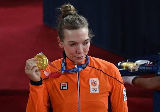 Gold medallist Netherlands' Shanne Braspennincx poses with her medal after the women's track cycling keirin final during the Tokyo 2020 Olympic Games...