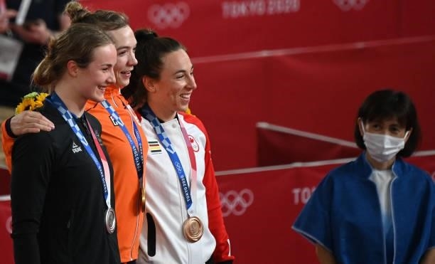 Bronze medallist Canada's Lauriane Genest, gold medallist Netherlands' Shanne Braspennincx and silver medallist New Zealand's Ellesse Andrews pose...