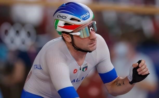 Italy's Elia Viviani reacts after winning bronze in the men's track cycling omnium points race during the Tokyo 2020 Olympic Games at Izu Velodrome...