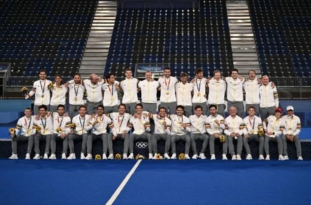 Belgium's gold medallists pose on the podium during the medal ceremony of the Tokyo 2020 Olympic Games men's field hockey competition, at the Oi...
