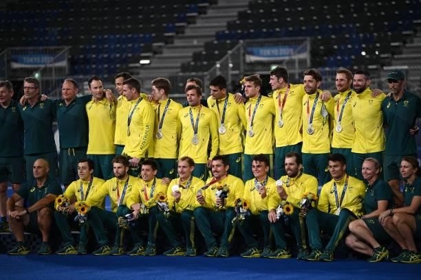 Australia's silver medallists pose on the podium during the medal ceremony of the Tokyo 2020 Olympic Games men's field hockey competition, at the Oi...