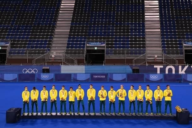 Australia's silver medallists pose on the podium during the medal ceremony of the Tokyo 2020 Olympic Games men's field hockey competition, at the Oi...