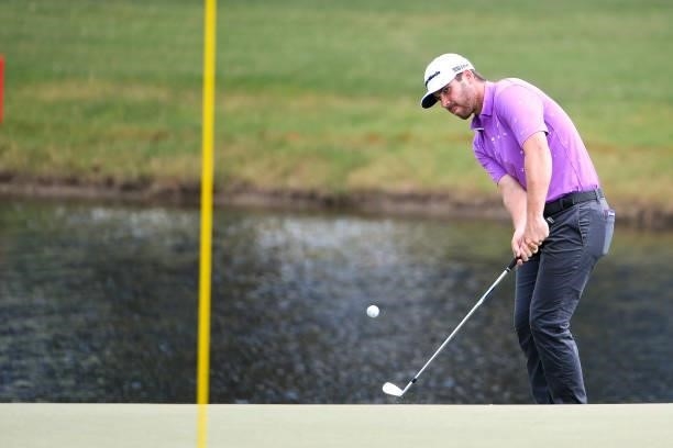 Matthew Wolff chips up to the 18th green during the first round of the World Golf Championships-FedEx St. Jude Invitational at TPC Southwind on...