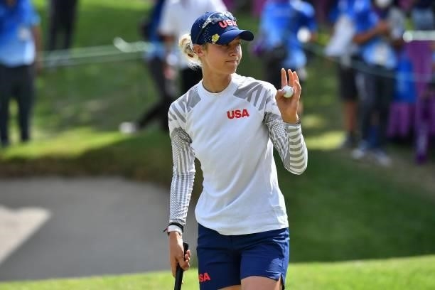 S Nelly Korda gestures after her putt on the 18th green in round 3 of the womens golf individual stroke play during the Tokyo 2020 Olympic Games at...