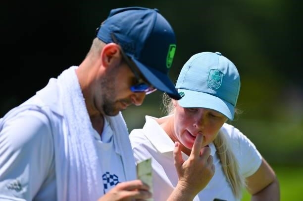 Saitama , Japan - 6 August 2021; Stephanie Meadow of Ireland wth her caddie Kyle Kallan during round three of the women's individual stroke play at...