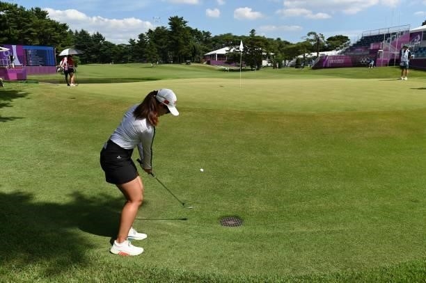 China's Lin Xiyu plays out of the rough next to the 18th green in round 3 of the womens golf individual stroke play during the Tokyo 2020 Olympic...