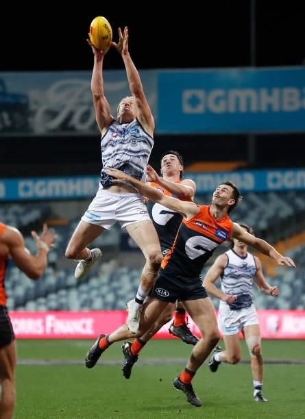 Rhys Stanley of the Cats and Zach Sproule of the Giants in action during the 2021 AFL Round 21 match between the Geelong Cats and the GWS Giants at...