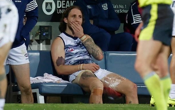 Zach Tuohy of the Cats is seen on the bench during the 2021 AFL Round 21 match between the Geelong Cats and the GWS Giants at GMHBA Stadium on August...