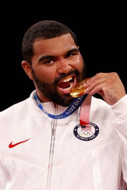 Gold medalist USA's Gable Dan Steveson poses with his medal on the podium after the men's freestyle 125kg wrestling competition during the Tokyo 2020...