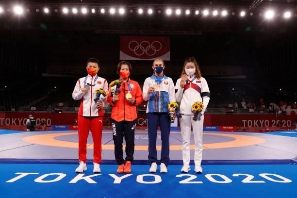 Silver medalist China's Pang Qianyu, gold medalist Japan's Mayu Mukaida, bronze medalist Belarus' Vanesa Kaladzinskaya and bronze medalist Mongolia's...
