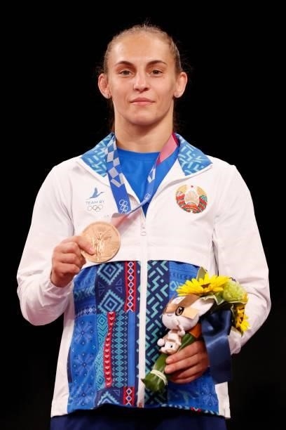 Bronze medalist Belarus' Vanesa Kaladzinskaya poses with her medal on the podium after the women's freestyle 53kg wrestling competition during the...