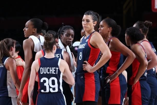 French players react after losing the women's semi-final basketball match between Japan and France during the Tokyo 2020 Olympic Games at the Saitama...