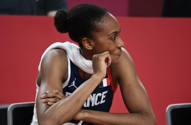 France's Sandrine Gruda looks on from the bench during the women's semi-final basketball match between Japan and France of the Tokyo 2020 Olympic...