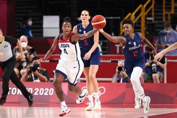 Jewell Loyd of the USA Women's National Team and Yvonne Anderson of the Serbia Women's National Team reach for the ball during semifinals of the 2020...