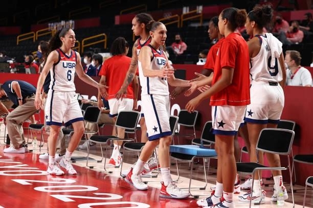 Diana Taurasi of the USA Women's National Team high-fives teammates during the game against the Serbia Women's National Team during semifinals of the...