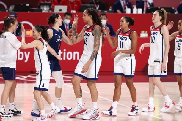 Brittney Griner of the USA Women's National Team high-fives Jelena Brooks of the Serbia Women's National Team after the game during semifinals of the...