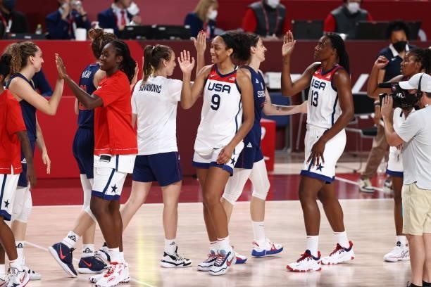 Ja Wilson of the USA Women's National Team high-fives Serbia Women's National Team players after the game during semifinals of the 2020 Tokyo...