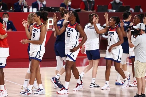 Sylvia Fowles of the USA Women's National Team high-fives Serbia Women's National Team players after the game during semifinals of the 2020 Tokyo...