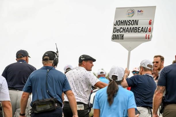 Bryson DeChambeau tosses a ball to fans during the second round of the World Golf Championships-FedEx St. Jude Invitational at TPC Southwind on...