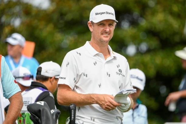 Justin Rose of England looks over his yardage book at the 10th tee during the second round of the World Golf Championships-FedEx St. Jude...