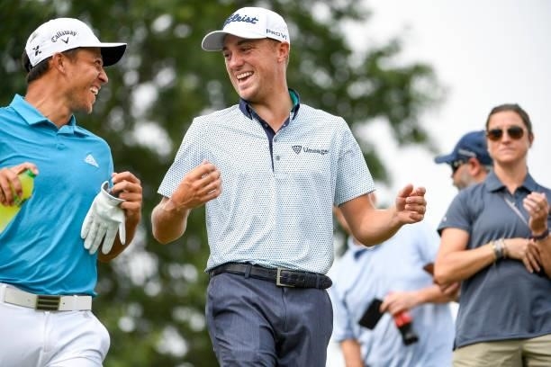 Xander Schauffele and Justin Thomas laugh while walking to the 10th tee during the second round of the World Golf Championships-FedEx St. Jude...