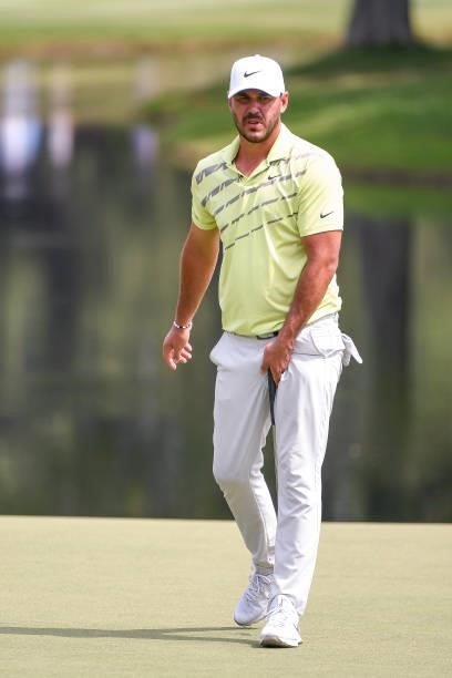 Brooks Kopeka at the 18th green during the second round of the World Golf Championships-FedEx St. Jude Invitational at TPC Southwind on August 6,...