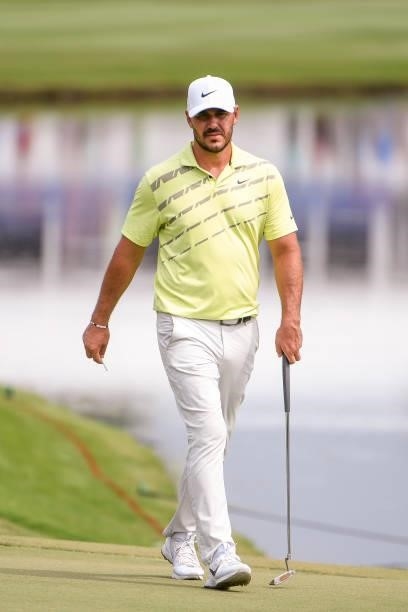 Brooks Kopeka walks up the 18th hole during the second round of the World Golf Championships-FedEx St. Jude Invitational at TPC Southwind on August...