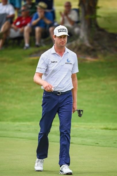 Harris English walks off the ninth hole green after making a par putt during the second round of the World Golf Championships-FedEx St. Jude...