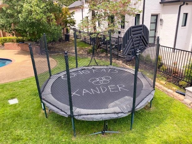 Trampoline in someones backyard at the 17th tee during the second round of the World Golf Championships-FedEx St. Jude Invitational at TPC Southwind...