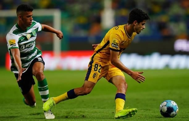 Tomas Silva of FC Vizela with Matheus Nunes of Sporting CP in action during the Liga Bwin match between Sporting CP and FC Vizela at Estadio Jose...