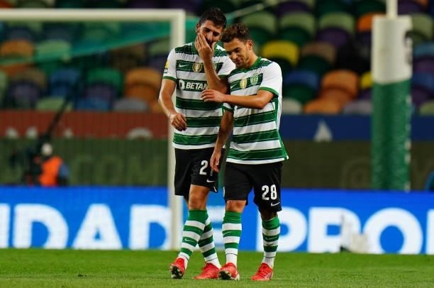 Paulinho of Sporting CP celebrates with teammate Pedro Goncalves of Sporting CP after scoring a goal during the Liga Bwin match between Sporting CP...