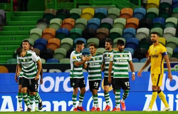 Pedro Goncalves of Sporting CP celebrates with teammates after scoring a goal during the Liga Bwin match between Sporting CP and FC Vizela at Estadio...