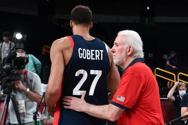 S coach Gregg Popovich gestures towards France's Rudy Gobert after France's defeat in the men's final basketball match between France and USA during...