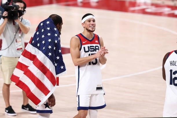 Devin Booker of the USA Men's National Team smiles after the game against the France Men's National Team during the Gold Medal Game of the 2020 Tokyo...