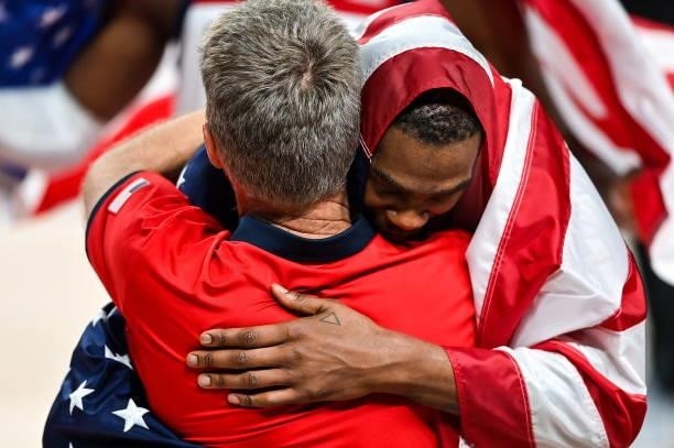 Tokyo , Japan - 7 August 2021; Kevin Durant of USA celebrates with assistant coach Steve Kerr after the men's gold medal match between the USA and...