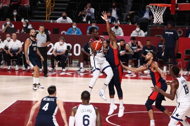 Jrue Holiday of the USA Men's National Team drives to the basket during the game against the France Men's National Team during the Gold Medal Game of...