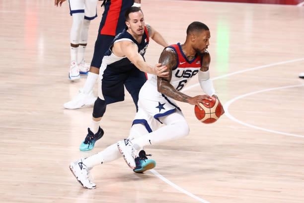 Damian Lillard of the USA Men's National Team drives to the basket during the game against the France Men's National Team during the Gold Medal Game...