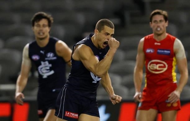 Ed Curnow of the Blues in celebrates during the 2021 AFL Round 21 match between the Carlton Blues and the Gold Coast Suns at Marvel Stadium on August...
