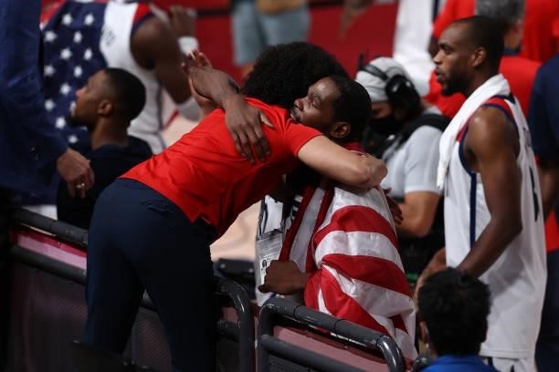 Kevin Durant of the USA Men's National Team hugs Head Coach Kara Lawson of the the USA Basketball Womens National 3x3 Team after the game against the...