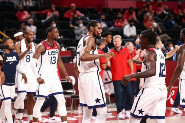 Kevin Durant of the USA Men's National Team and Jrue Holiday of the USA Men's National Team celebrate after defeating the France Men's National Team...