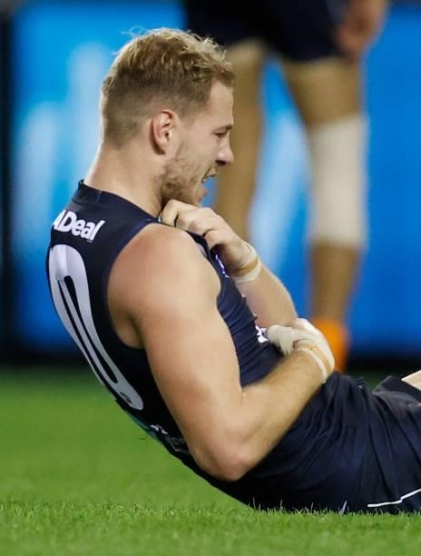 Harry McKay of the Blues is seen injured during the 2021 AFL Round 21 match between the Carlton Blues and the Gold Coast Suns at Marvel Stadium on...