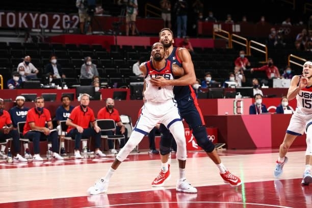 Kevin Durant of the USA Men's National Team and Rudy Gobert of the France Men's National Team fight for position during the Gold Medal Game of the...