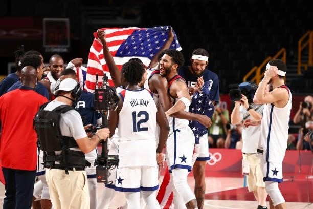 Jayson Tatum of the USA Men's National Team and the USA Men's National Team celebrate after defeating the France Men's National Team to win the Gold...