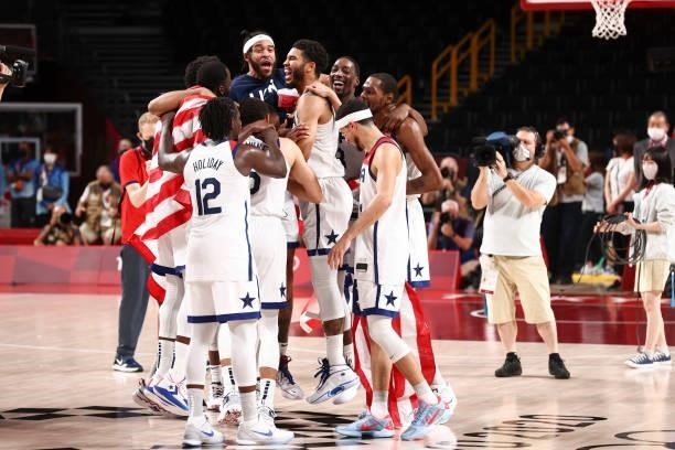 The USA Men's National Team celebrates after defeating the France Men's National Team to win the Gold Medal Game of the 2020 Tokyo Olympics at the...