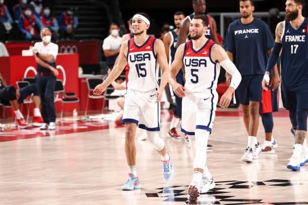Devin Booker of the USA Men's National Team and Zach LaVine of the USA Men's National Team celebrate after defeating the France Men's National Team...