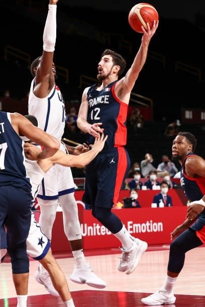 Nando de Colo of the France Men's National Team drives to the basket against the USA Men's National Team during the Gold Medal Game of the 2020 Tokyo...