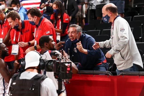Kevin Durant of the USA Men's National Team, Chip Engelland and Jeff Van Gundy celebrate after defeating the France Men's National Team to win the...